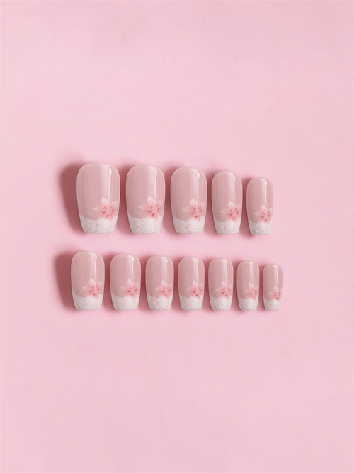 Press-on nails Pink Petals nude rosé avec French pailletée et fleurs roses – BAEYAH